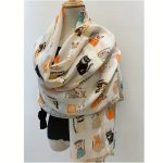 Bézs színű sál fekete és narancs macska mintával