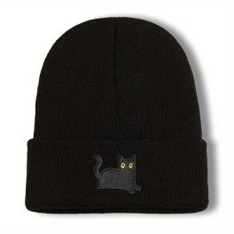 Fekete kötött sapka hímzett fekete cicával, sárga szemekkel